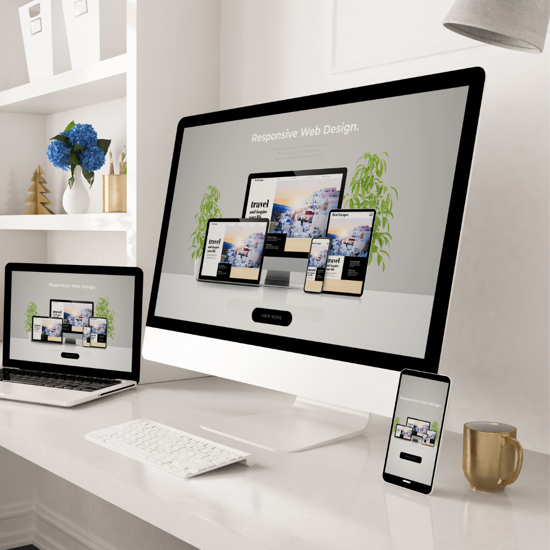 Desk with monitor showing responsive design